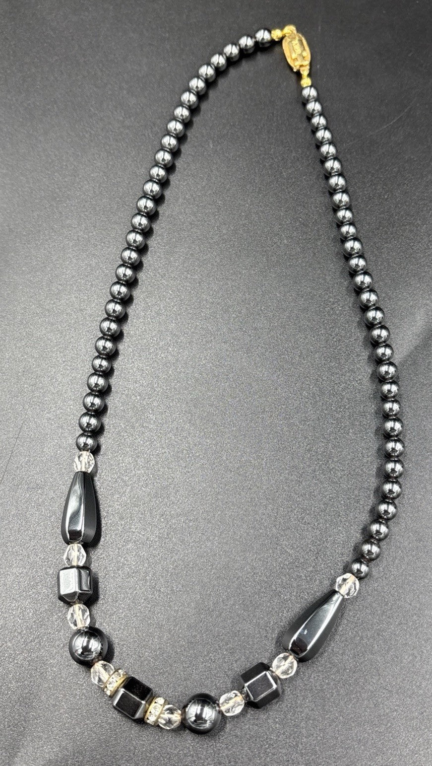 Vintage Brev. Metallic Black Crystal Glass Beads gold Tone Necklace. ￼