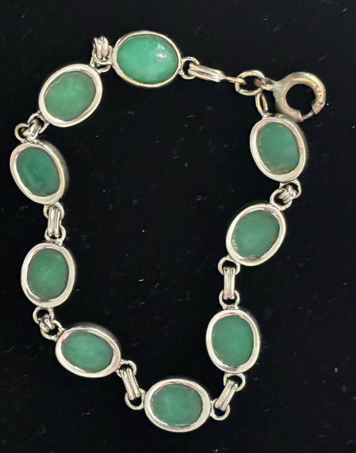 10K white gold jade bracelet oval cabochon bar link detail close-up natural green jade