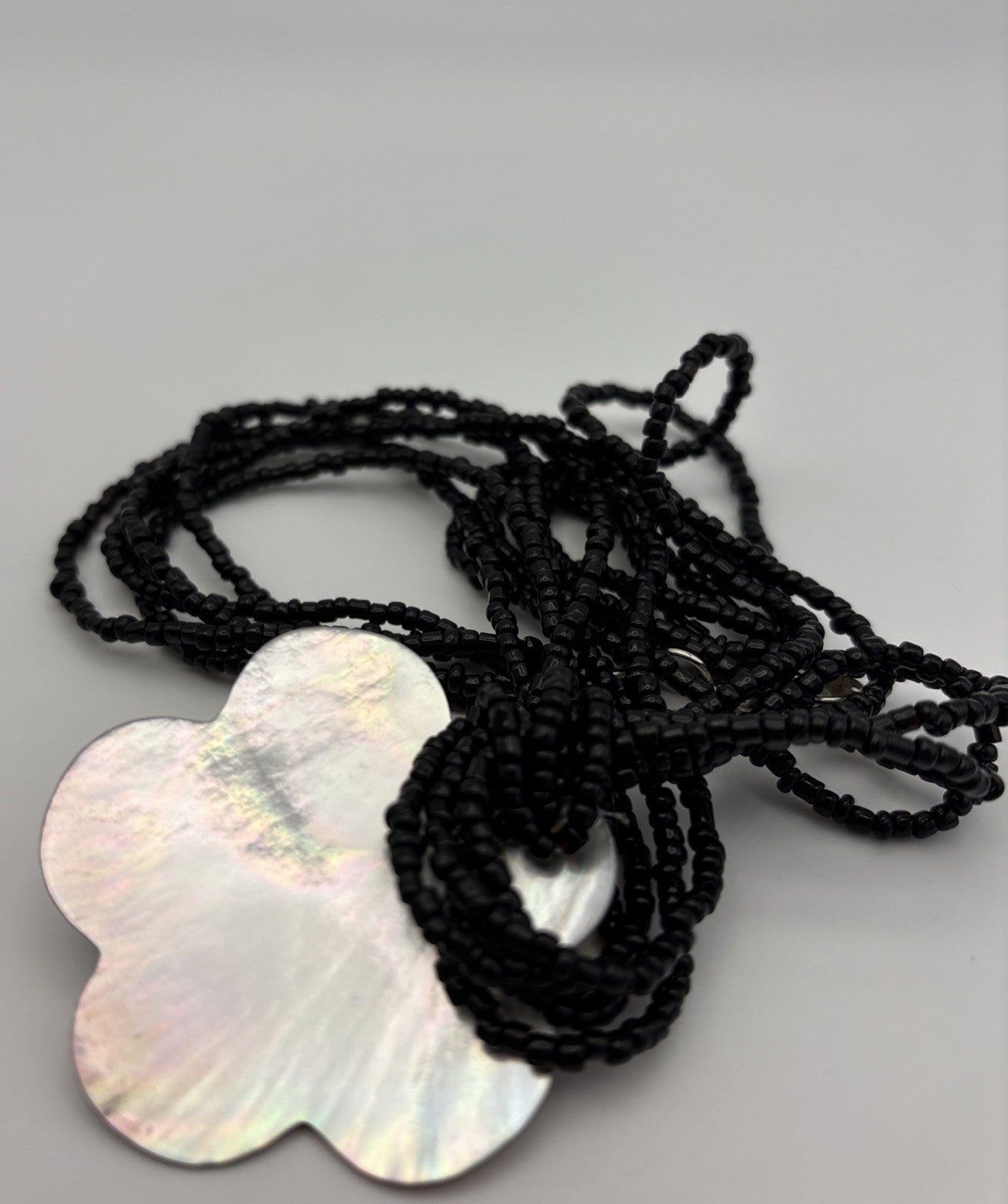 Vintage Mother of Pearl Flower Pendant Necklace Multi Strand Black Seed Beads