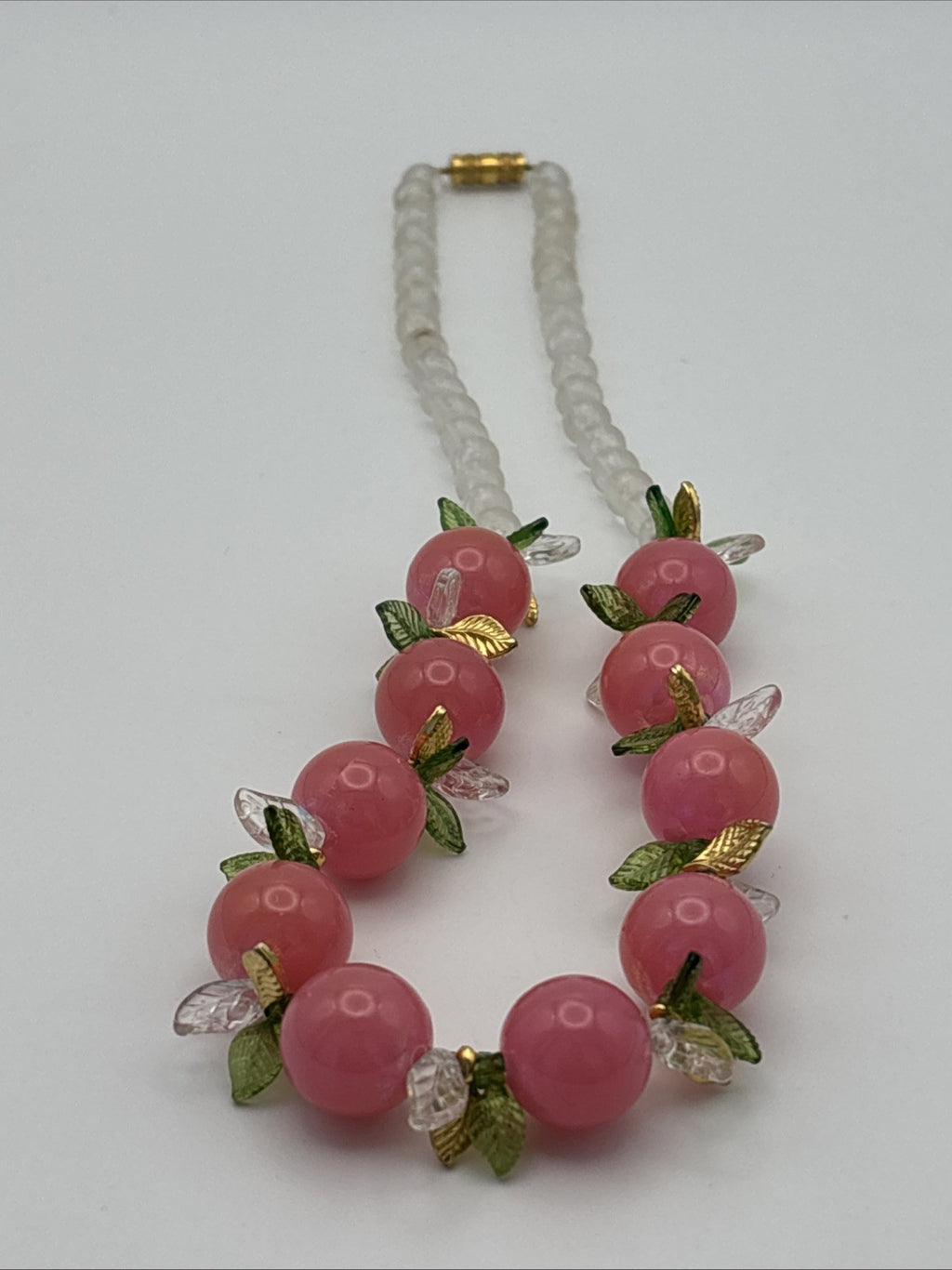 Vintage Pink Bead Fruit Necklace Clear Beads Gold and Green Leaf Accents