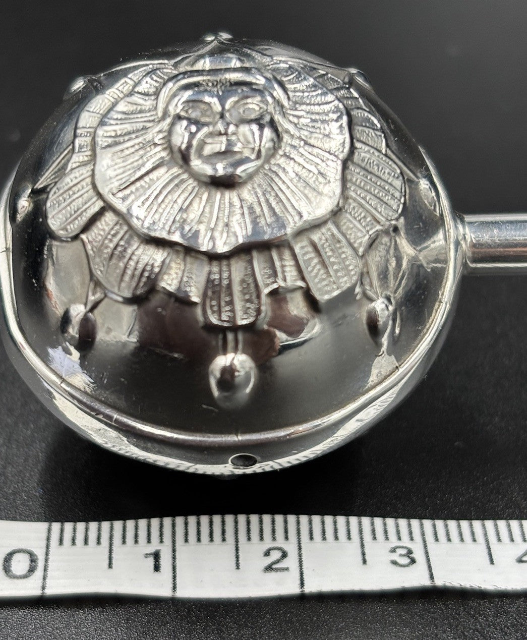 Antique Silver Baby Rattle Celestial Sun Face Repoussé