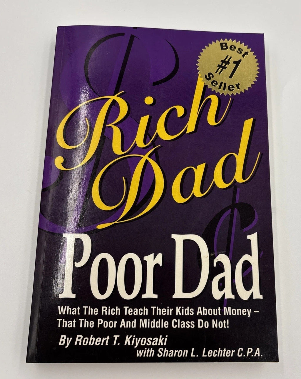 Rich Dad Poor Dad by Robert Kiyosaki – Best Seller Personal Finance Book
