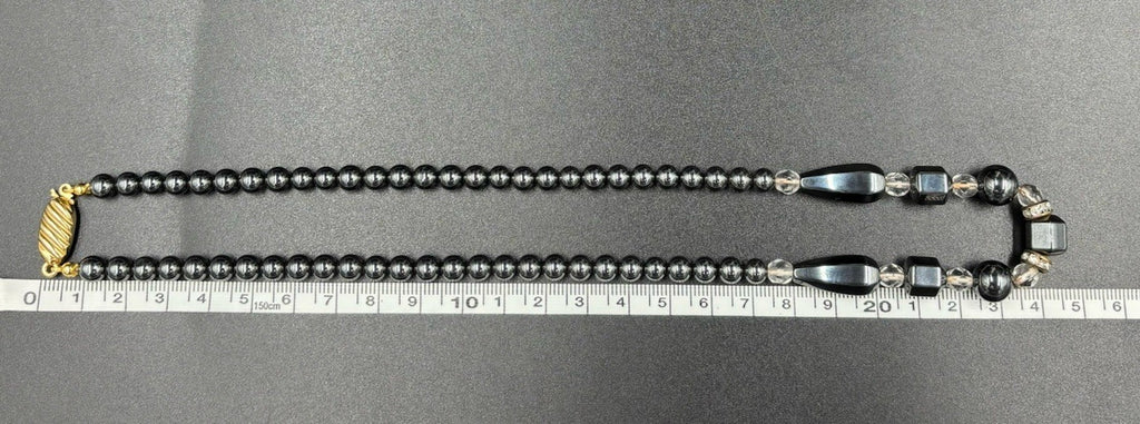 Vintage Brev. Metallic Black Crystal Glass Beads gold Tone Necklace. ￼