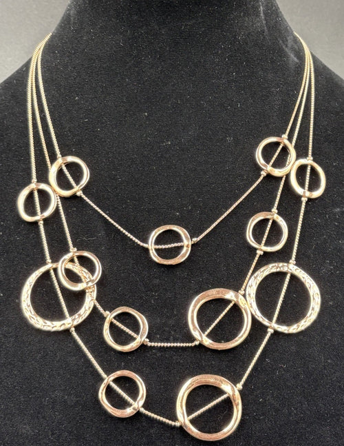 Jacqui E silver rose gold layered three strand statement necklace designer