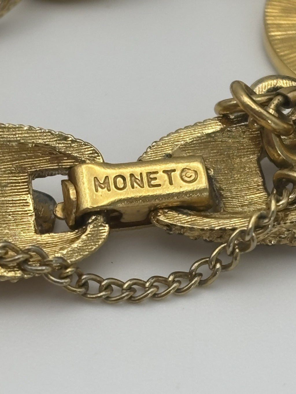 Vintage Monet Gold Tone Clover Charm Bracelet Textured Chain Signed Mid Century